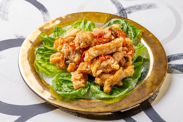 越しの鶏の唐揚げ　葱姜醤ソース